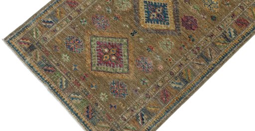 Backside of handmade New Kazak rug showing knot structure and weave density