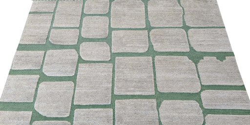 Backside of handmade New Morocco rug showing knot structure and weave density
