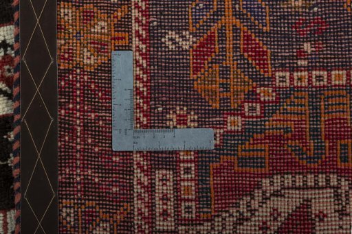 Surface texture of 2000s Shiraz rug with natural Wool and intricate pattern