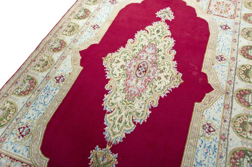 Backside of handmade 1970s Kerman rug showing knot structure and weave density