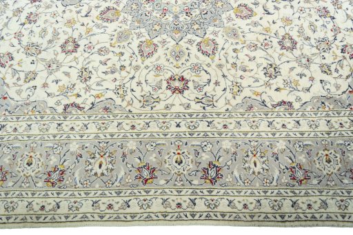 Corner detail of New Kashan rug showing border pattern and Cork pile