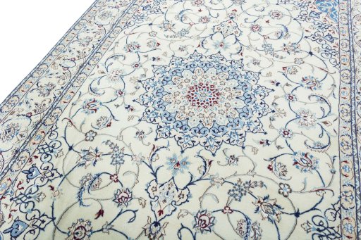 Backside of handmade 2000s Nain rug showing knot structure and weave density