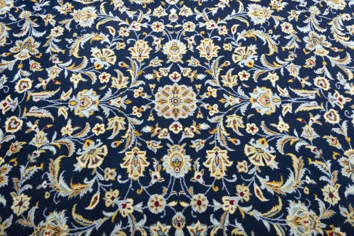 Central medallion detail of 2000s Kashan rug from Iran / Persia