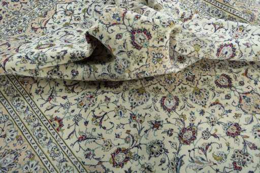 Surface texture of 2000s Kashan rug with natural Wool and intricate pattern