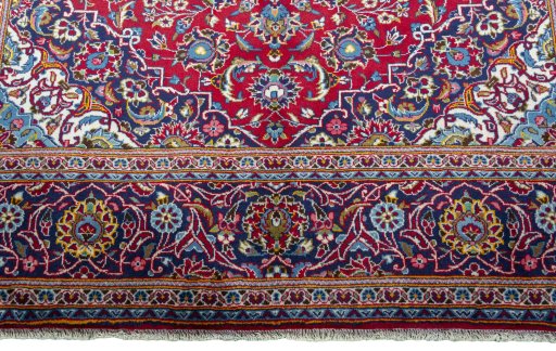 Full view of New Kashan rug from Iran / Persia, 302 × 200 cm in Red tones