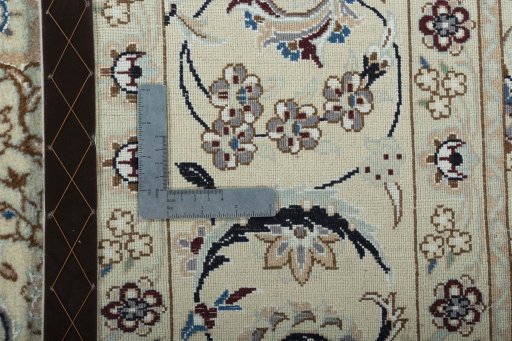 Backside of handmade 2000s Nain rug showing knot structure and weave density