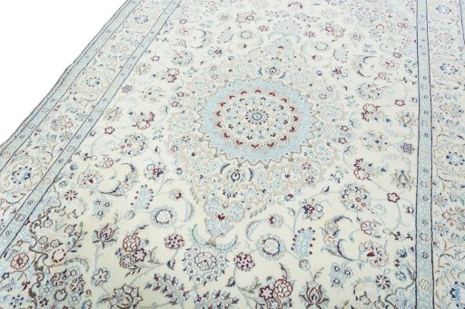 Backside of handmade 2000s Nain rug showing knot structure and weave density