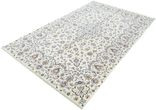 Corner detail of New Kashan rug showing border pattern and Wool pile
