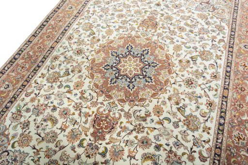 Backside of handmade 2000s Tabriz 50/60/70 Raj rug showing knot structure and weave density