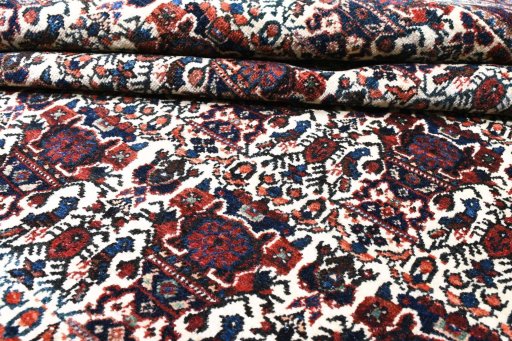 Close-up detail of 1950s Abadeh rug from Iran / Persia showing Wool weave