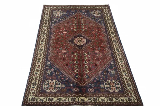 Surface texture of 2000s Abadeh rug with natural Wool and intricate pattern