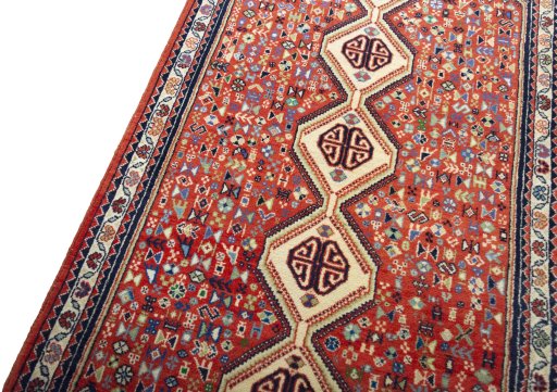 Backside of handmade 2000s Abadeh rug showing knot structure and weave density