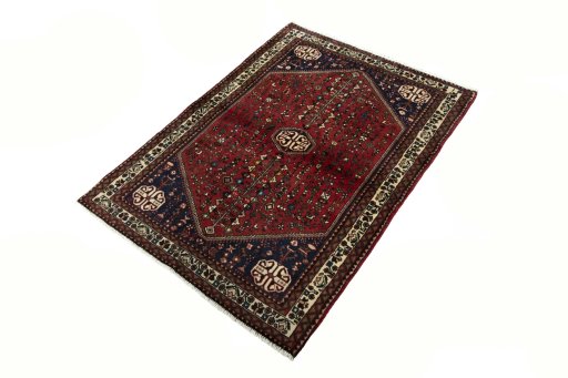 Corner detail of 2000s Abadeh rug showing border pattern and Wool pile