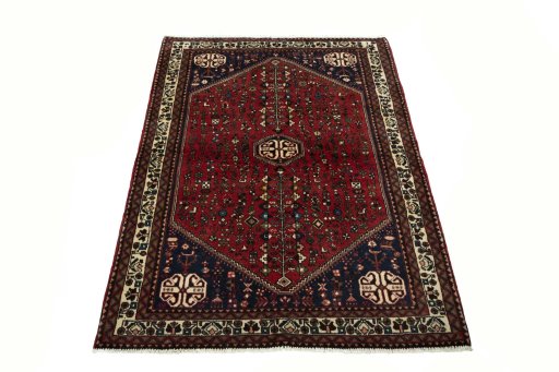 Surface texture of 2000s Abadeh rug with natural Wool and intricate pattern