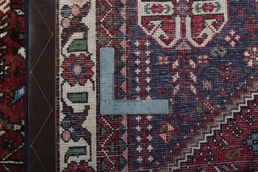 Surface texture of 2000s Abadeh rug with natural Wool and intricate pattern