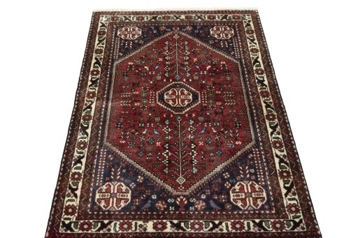 Surface texture of 2000s Abadeh rug with natural Wool and intricate pattern