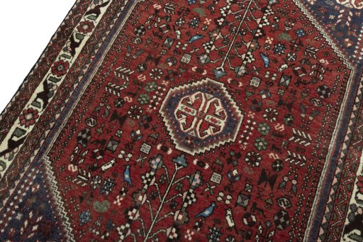 Backside of handmade 2000s Abadeh rug showing knot structure and weave density