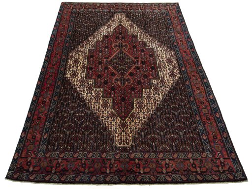 Surface texture of 1970s Afshar rug with natural Wool and intricate pattern