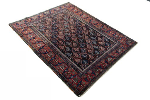 Close-up detail of 1930s Afshar rug from Iran / Persia showing Wool weave