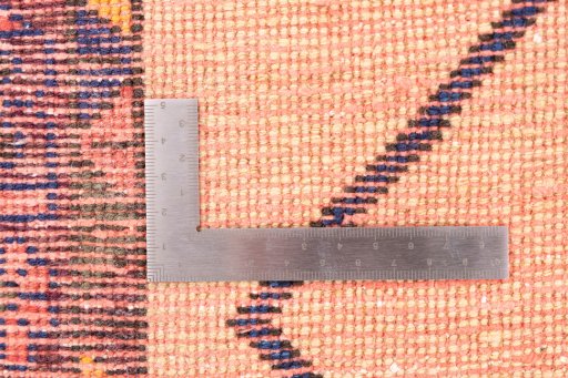 Corner detail of 1970s Afshar rug showing border pattern and Wool pile