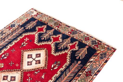 Surface texture of 1975s Afshar rug with natural Wool and intricate pattern