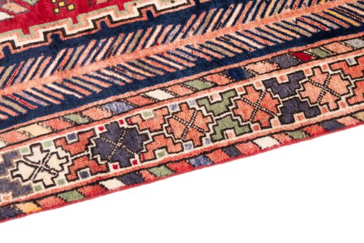 Backside of handmade 1975s Afshar rug showing knot structure and weave density