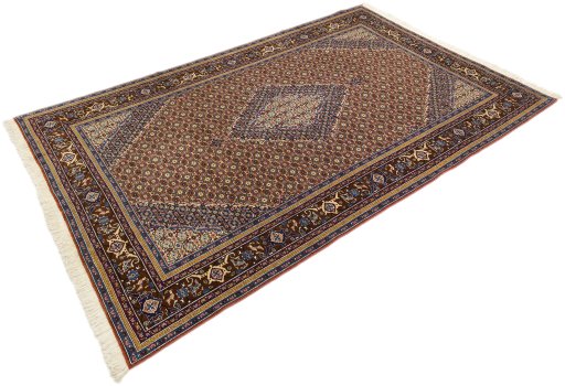 Corner detail of 1990s Ardebil rug showing border pattern and Wool pile