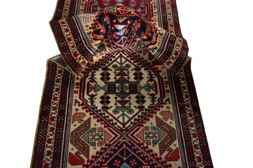 Corner detail of 2000s Ardebil rug showing border pattern and Wool pile