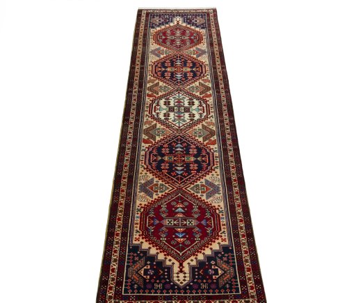 Surface texture of 2000s Ardebil rug with natural Wool and intricate pattern