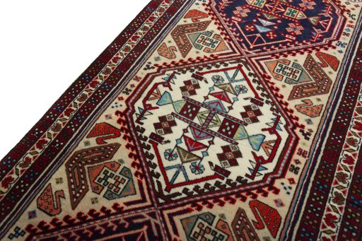 Backside of handmade 2000s Ardebil rug showing knot structure and weave density