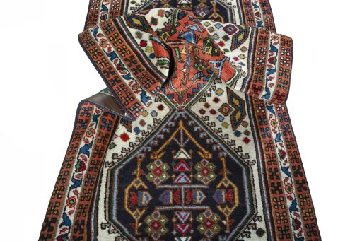 Corner detail of 2000s Ardebil rug showing border pattern and Wool pile