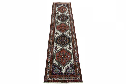 Surface texture of 2000s Ardebil rug with natural Wool and intricate pattern