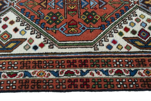 Close-up detail of 2000s Ardebil rug from Iran / Persia showing Wool weave