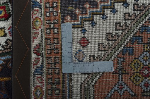 Close-up detail of 2000s Ardebil rug from Iran / Persia showing Wool weave