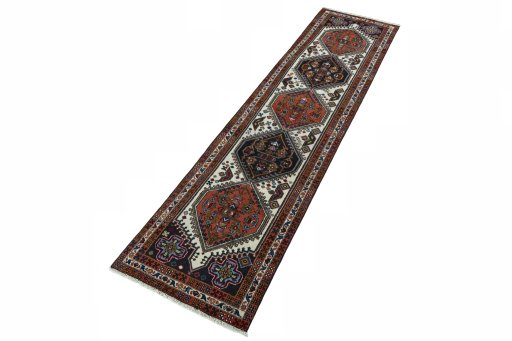 Corner detail of 2000s Ardebil rug showing border pattern and Wool pile