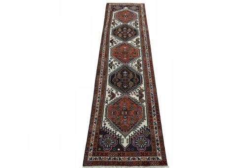 Surface texture of 2000s Ardebil rug with natural Wool and intricate pattern