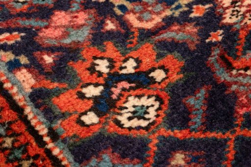 Surface texture of 2018s Ardebil rug with natural Wool and intricate pattern