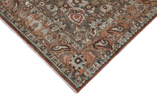 Backside of handmade 1950s Bakhtiar rug showing knot structure and weave density
