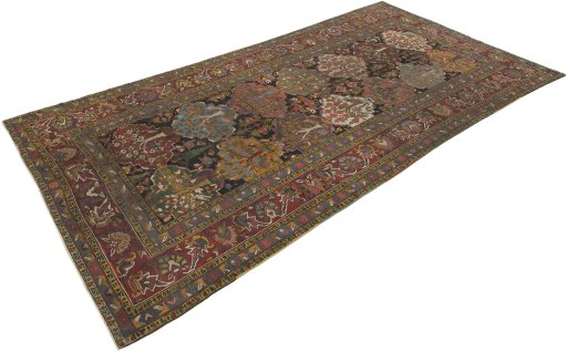 Close-up detail of 1900s Bakhtiar rug from Iran / Persia showing Wool weave
