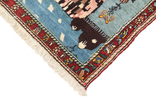Surface texture of 1920s Bakhtiar rug with natural Wool and intricate pattern