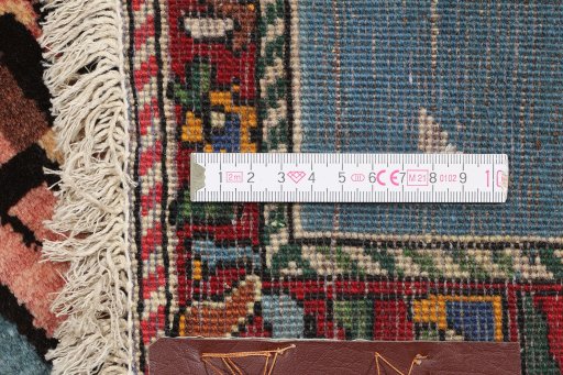 Close-up detail of 1920s Bakhtiar rug from Iran / Persia showing Wool weave