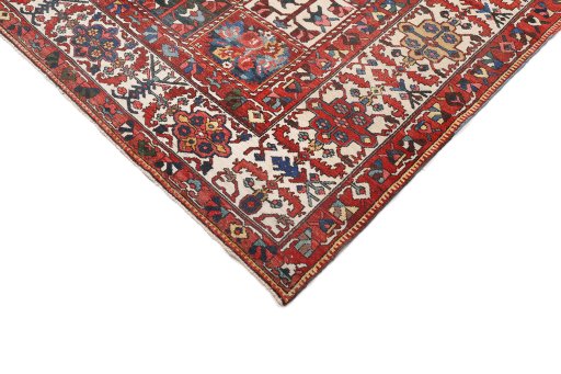 Surface texture of 1920s Bakhtiar rug with natural Wool and intricate pattern