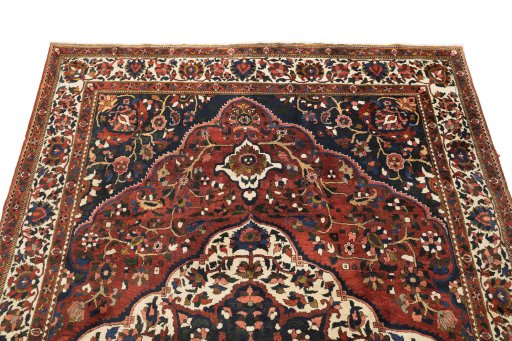 Surface texture of 1940s Bakhtiar rug with natural Wool and intricate pattern