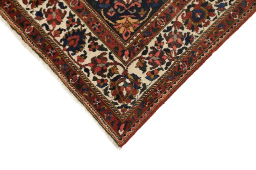 Backside of handmade 1940s Bakhtiar rug showing knot structure and weave density