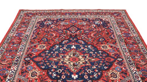 Surface texture of 1940s Bakhtiar rug with natural Wool and intricate pattern