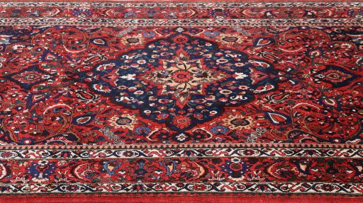 Close-up detail of 1940s Bakhtiar rug from Iran / Persia showing Wool weave