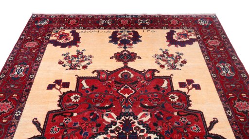 Surface texture of 1960s Bakhtiar rug with natural Wool and intricate pattern
