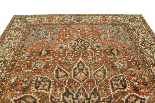 Surface texture of 1920s Bakhtiar rug with natural Wool and intricate pattern
