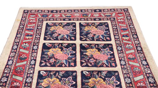 Surface texture of 1980s Bakhtiar rug with natural Wool and intricate pattern