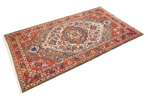 Corner detail of 1940s Bakhtiar rug showing border pattern and Wool pile